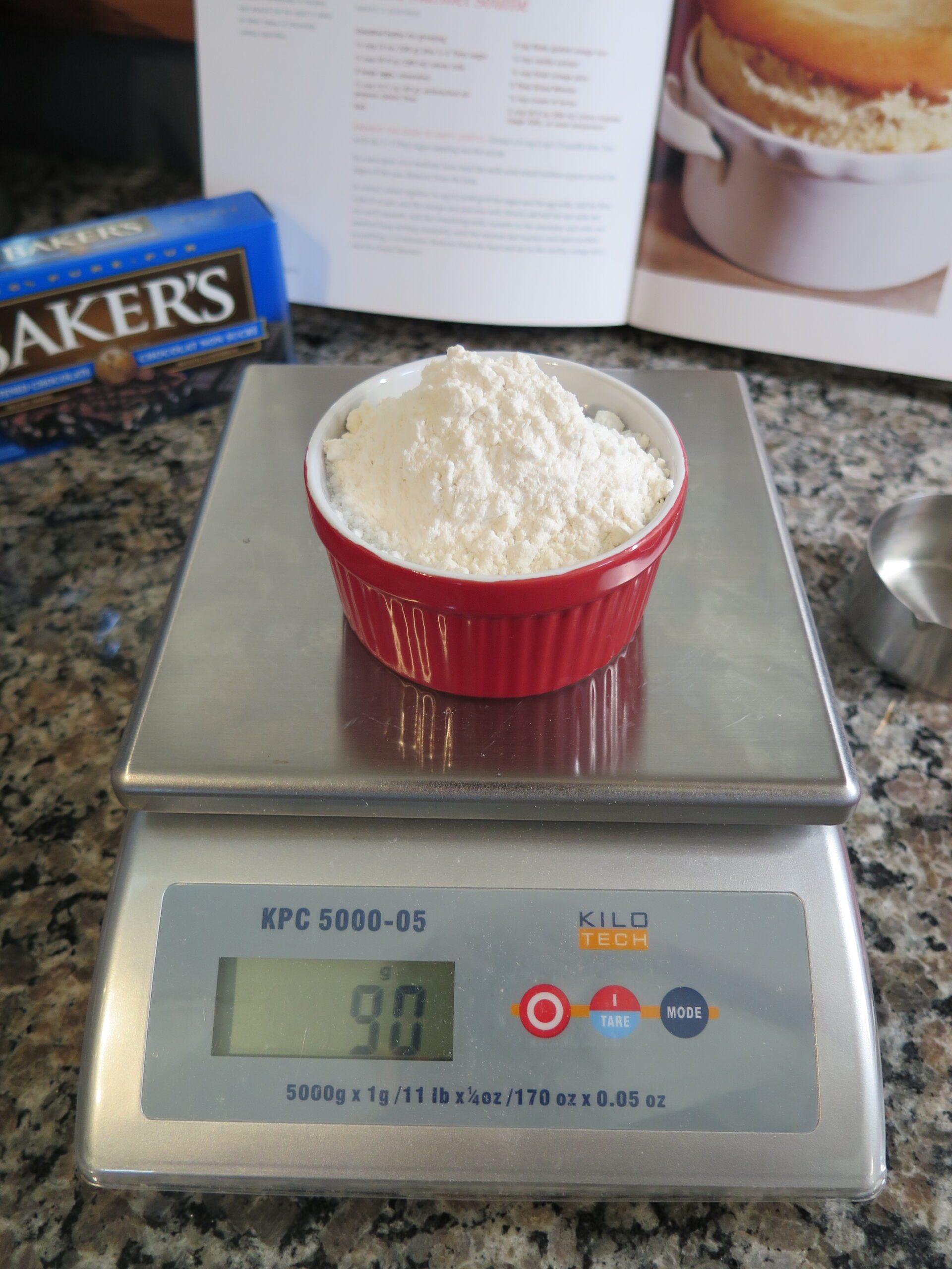 cake flour weighed on a kitchen scale