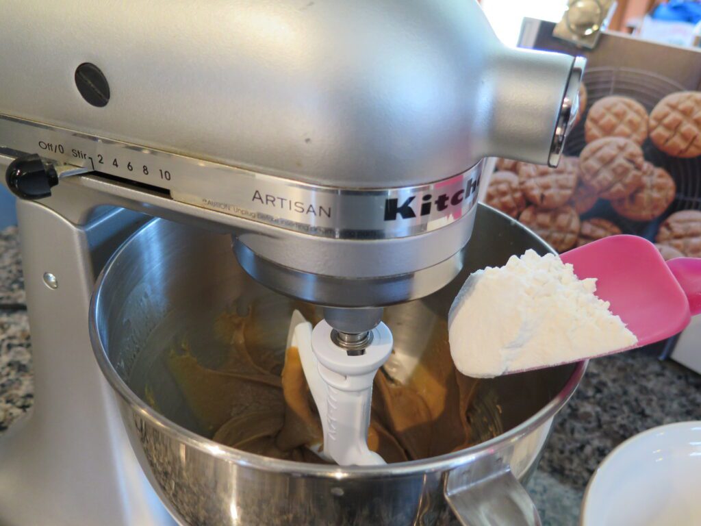 Peanut Butter Cookies adding drying ingredients to mixed wet ingredients
