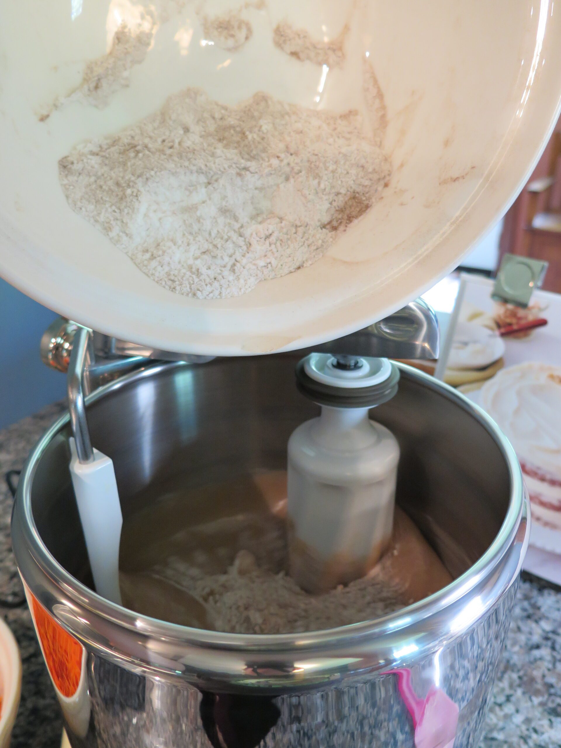 dry ingredients being added to wet