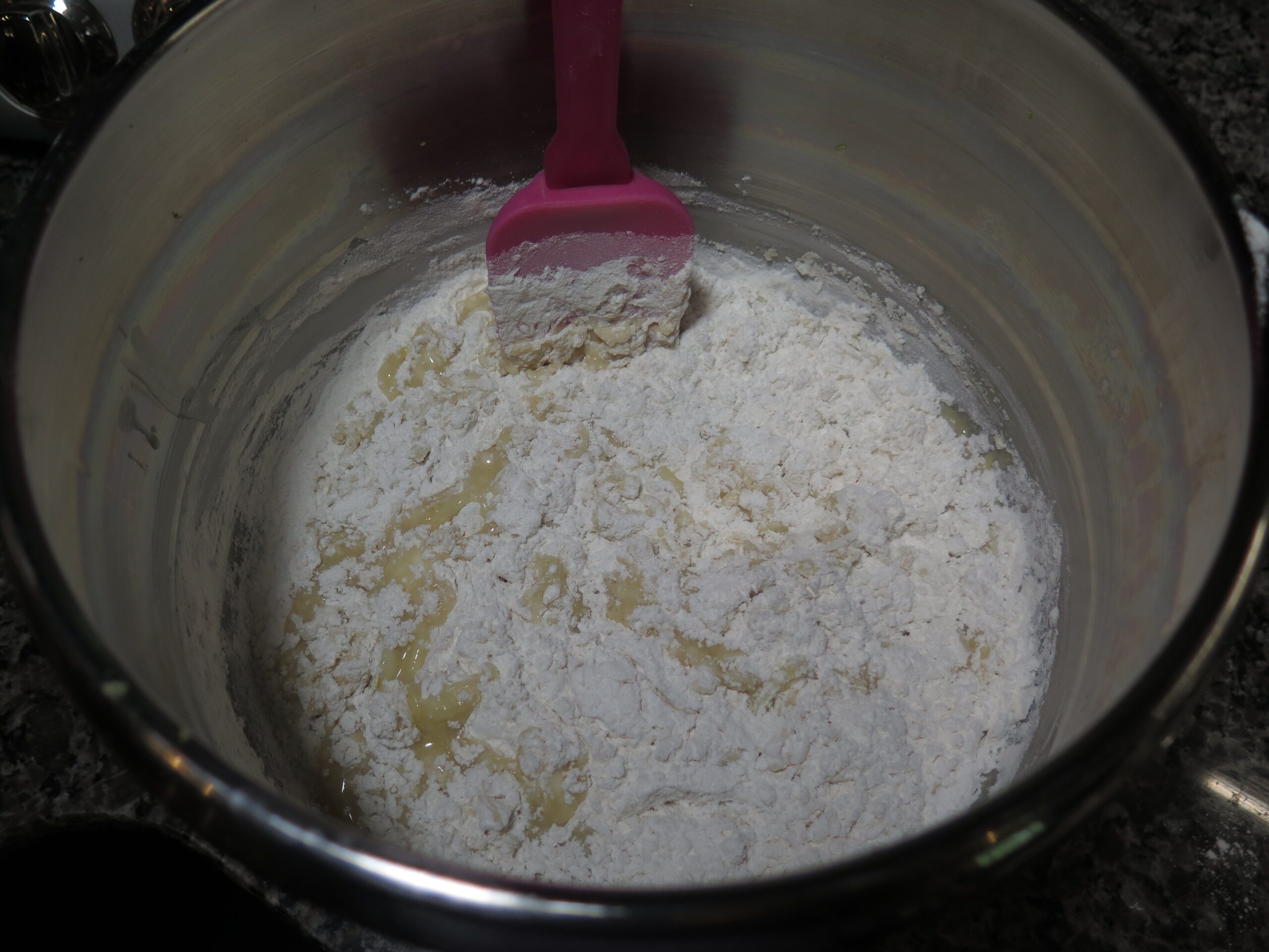 Dry ingredients added to wet ingredients