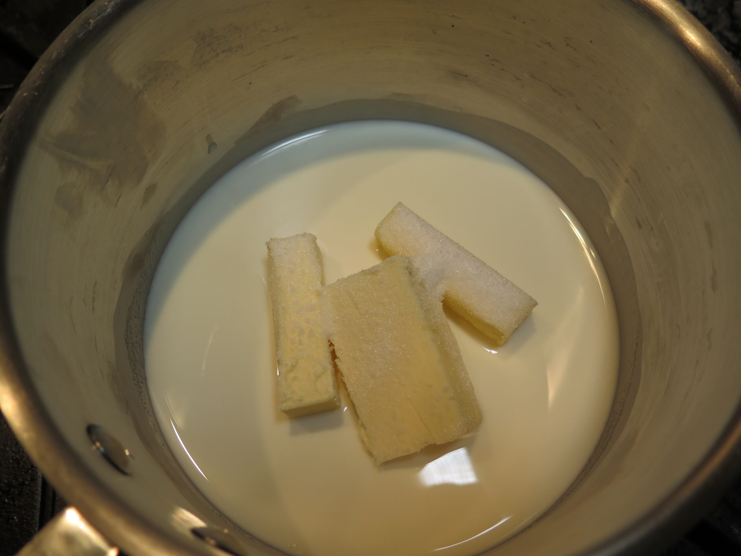 Butter, milk, sugar and salt in a sauce pot