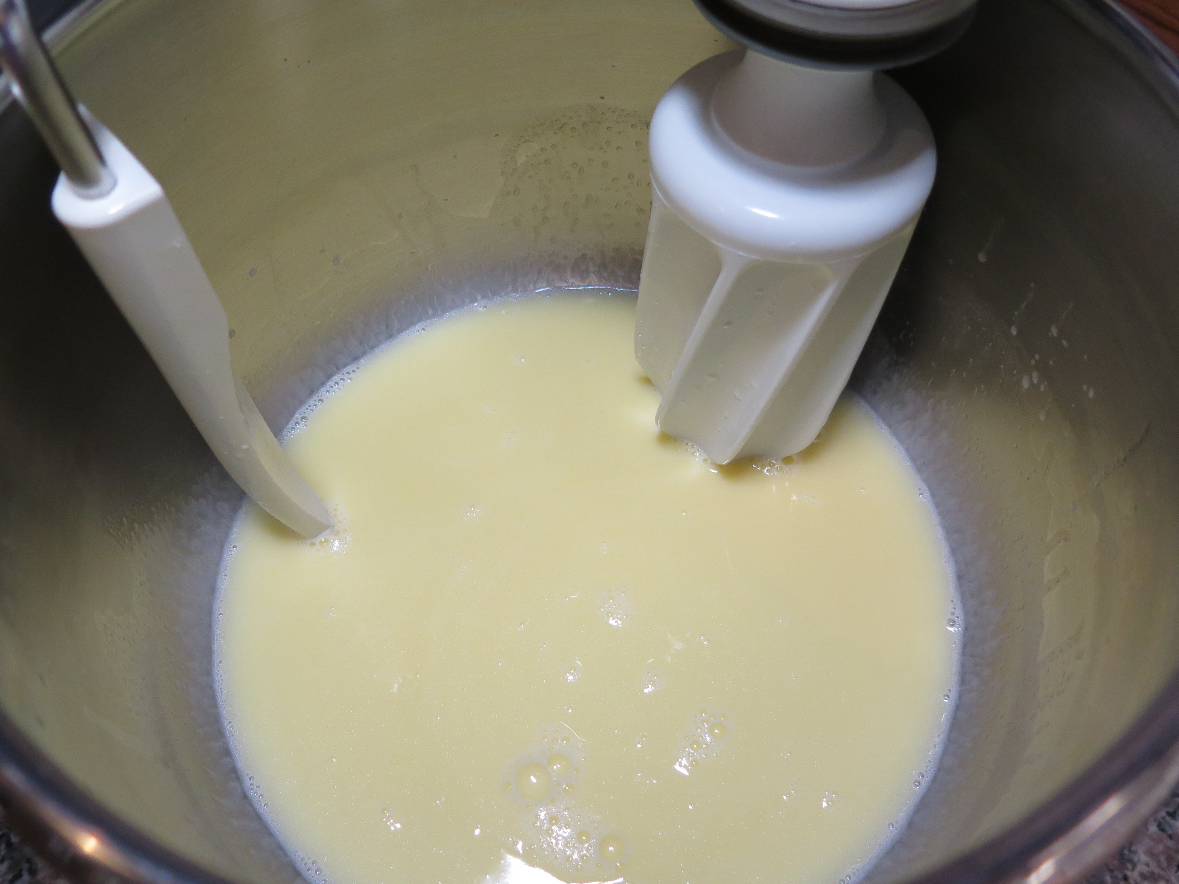 Add liquid ingredients to bowl of stand mixer