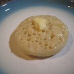 Crumpet with melted butter