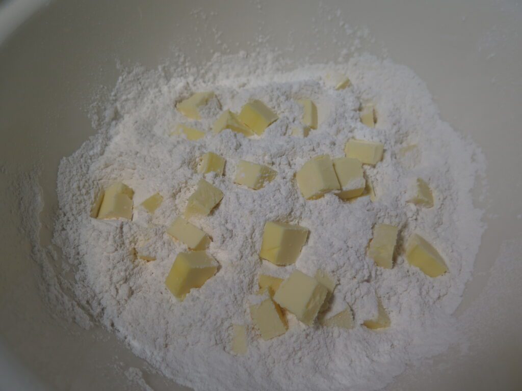 cubed butter in flour